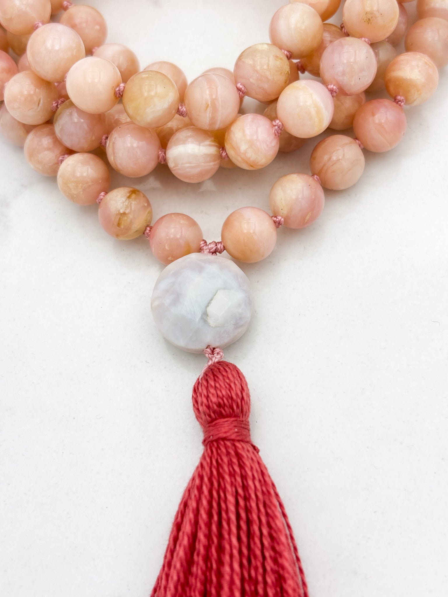 pink opal gemstone mala with peruvian opal guru bead and pink tassel | radiant malas | handmade in boulder, colorado