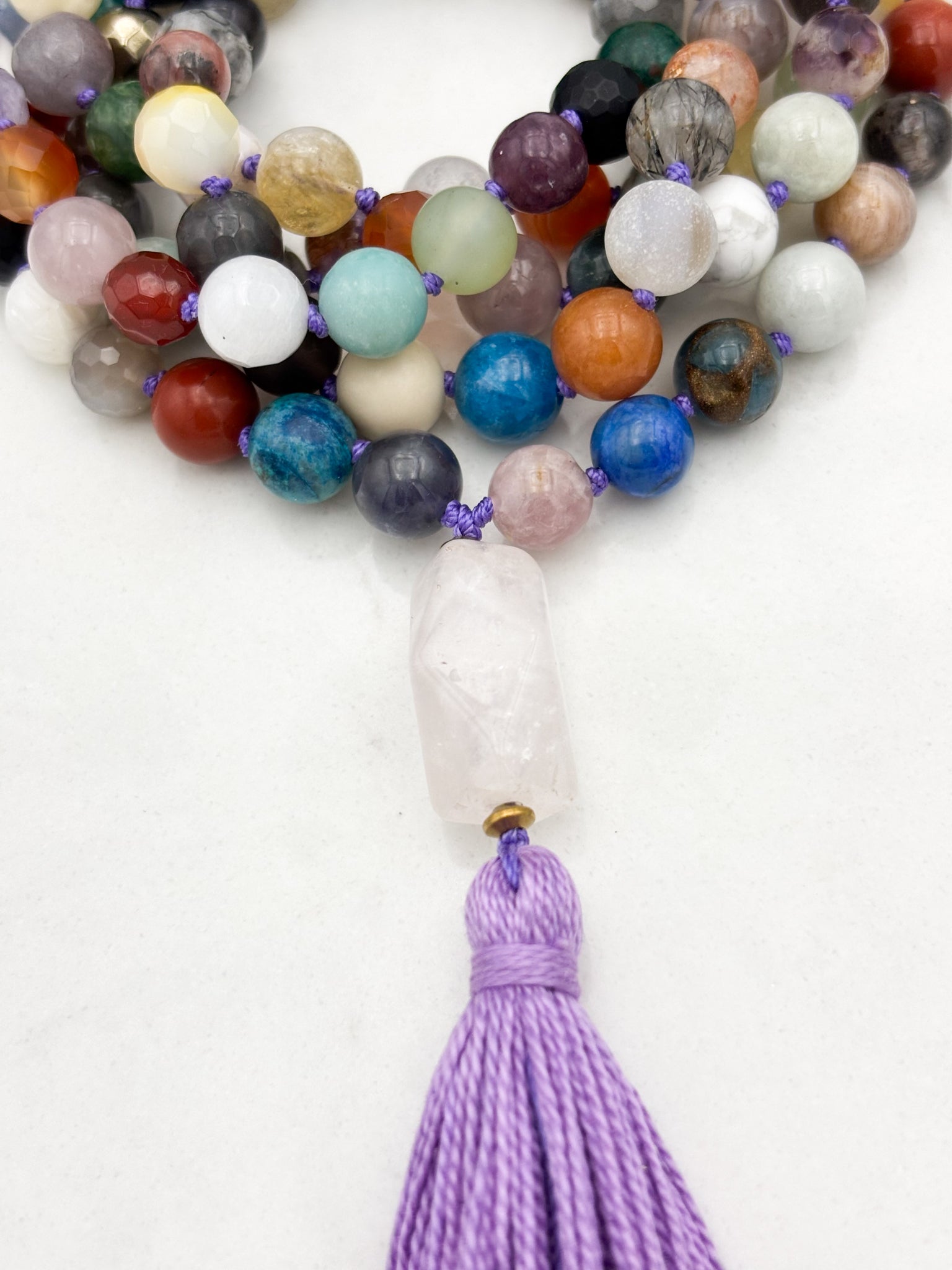 mixed gemstone mala necklace with rose quartz guru bead and purple tassel | radiant malas | handmade in boulder, colorado