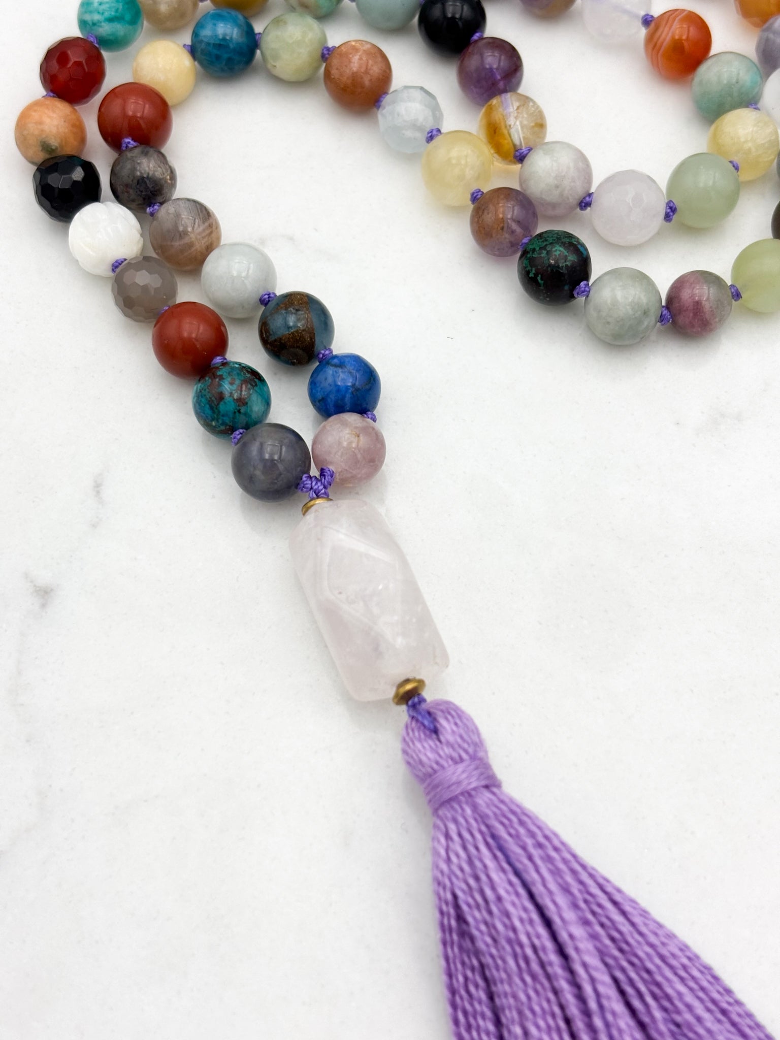 mixed gemstone mala necklace with rose quartz guru bead and purple tassel | radiant malas | handmade in boulder, colorado