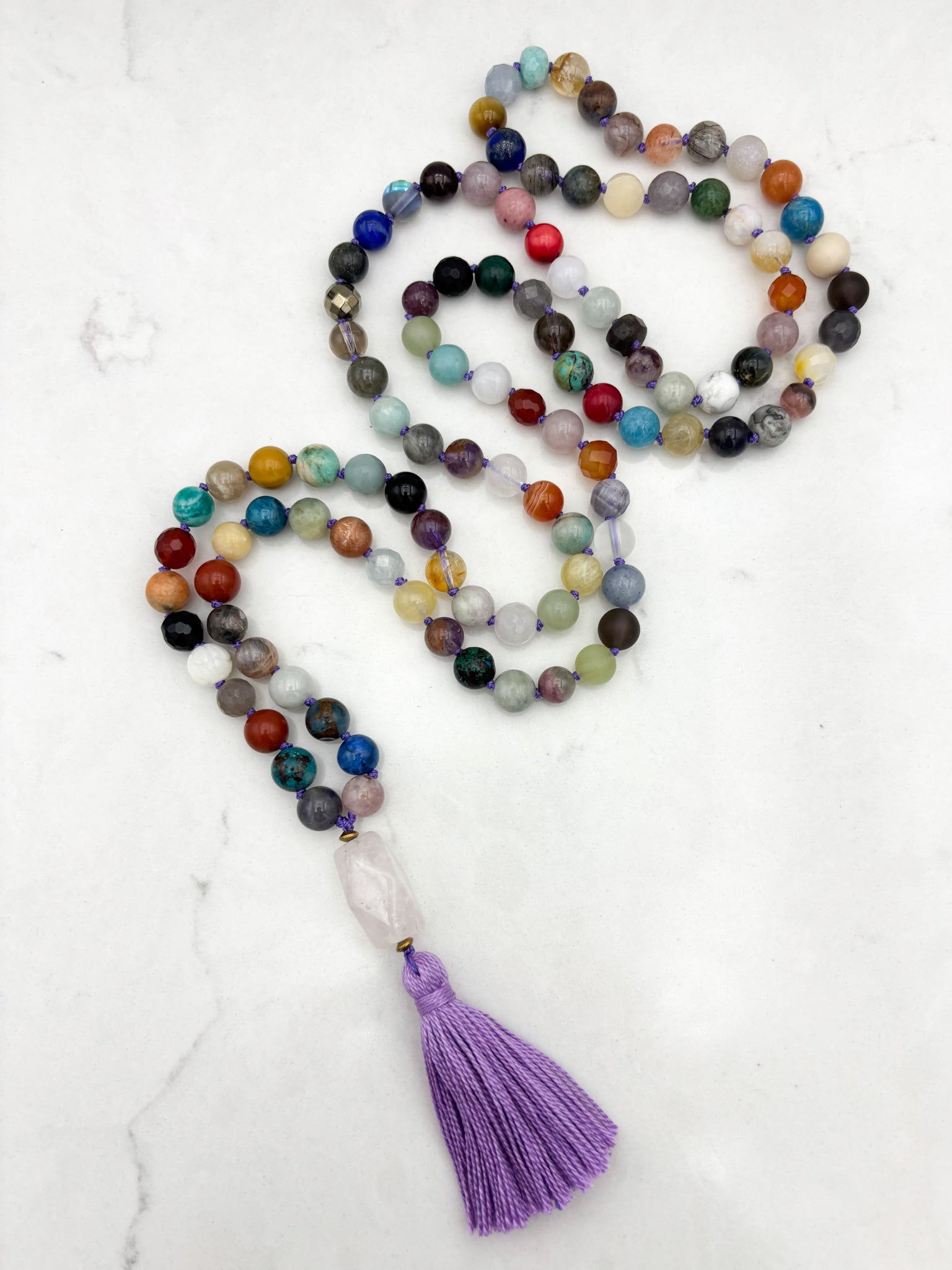 mixed gemstone mala necklace with rose quartz guru bead and purple tassel | radiant malas | handmade in boulder, colorado