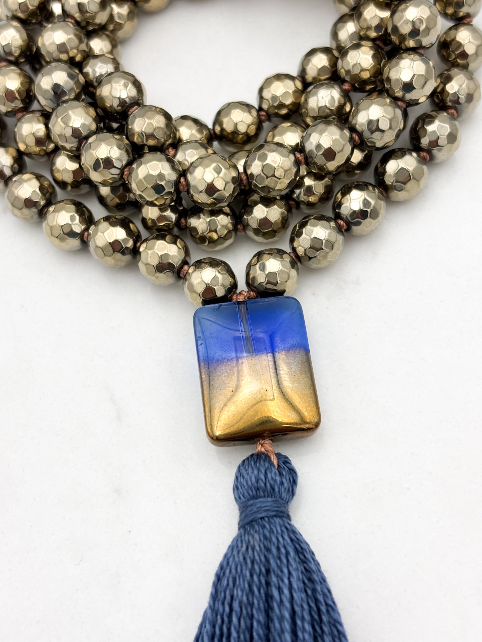 pyrite gemstone mala with 2-toned glass guru bead and blue tassel | radiant malas | handmade in boulder, colorado