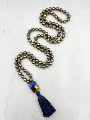 pyrite gemstone mala with 2-toned glass guru bead and blue tassel | radiant malas | handmade in boulder, colorado