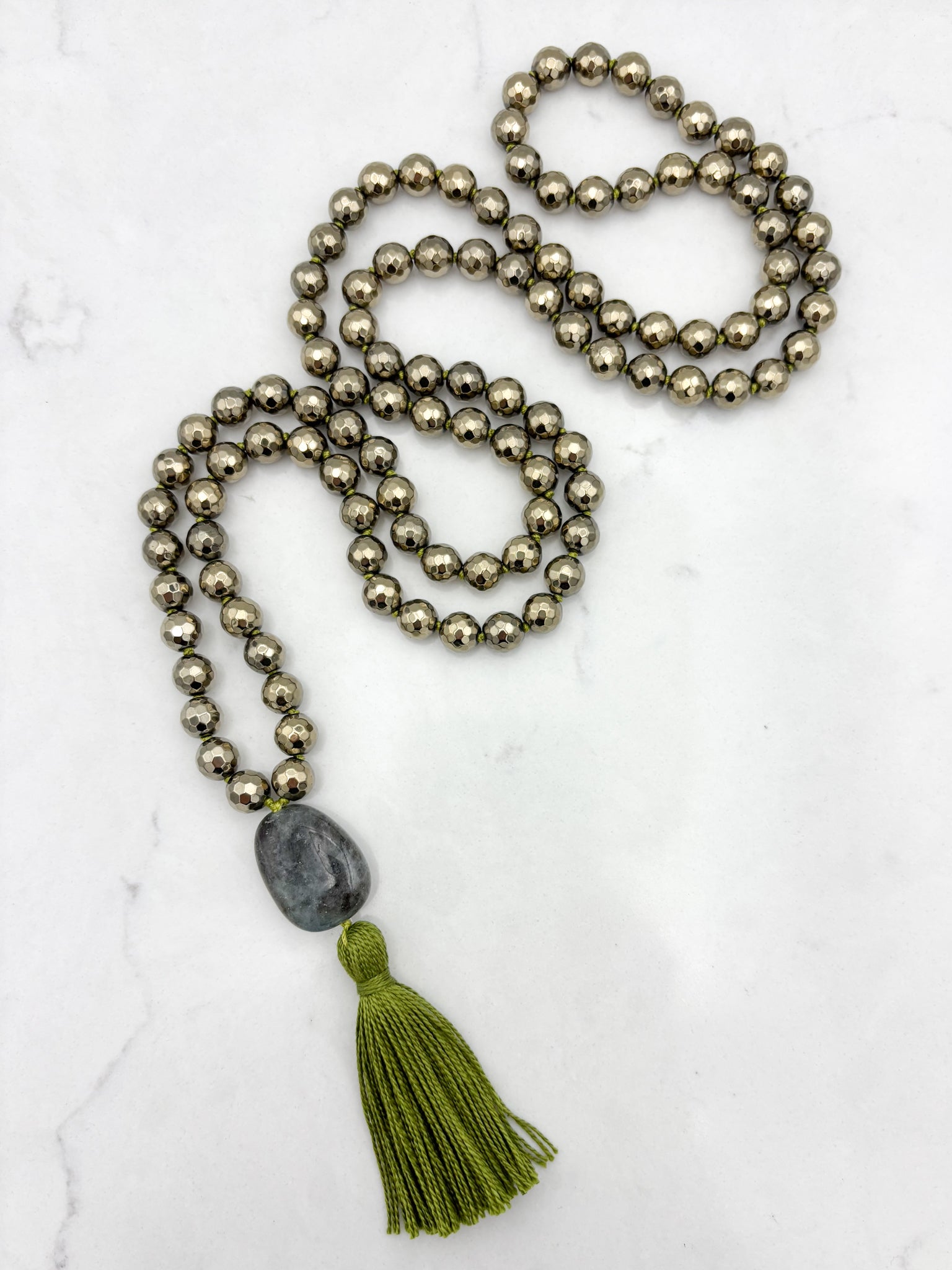 pyrite gemstone mala necklace with aquamarine guru bead and green tassel | radiant malas | handmade in boulder, colorado