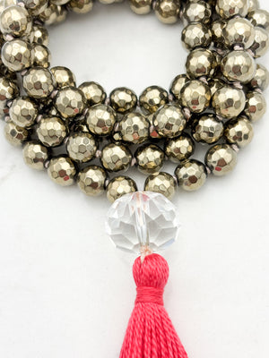 pyrite gemstone mala with faceted rock quartz guru bead and bright pink tassel | radiant malas | handmade in boulder, colorado