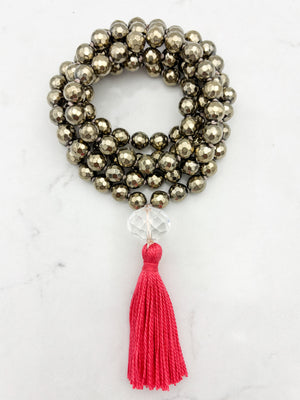 pyrite gemstone mala with faceted rock quartz guru bead and bright pink tassel | radiant malas | handmade in boulder, colorado