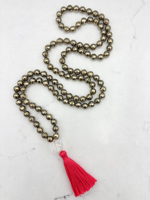 pyrite gemstone mala with faceted rock quartz guru bead and bright pink tassel | radiant malas | handmade in boulder, colorado