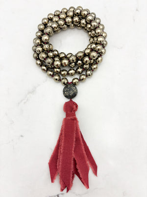 pyrite gemstone mala necklace with pyrite guru bead and burgundy silk tassel | radiant malas | handmade in boulder, colorado