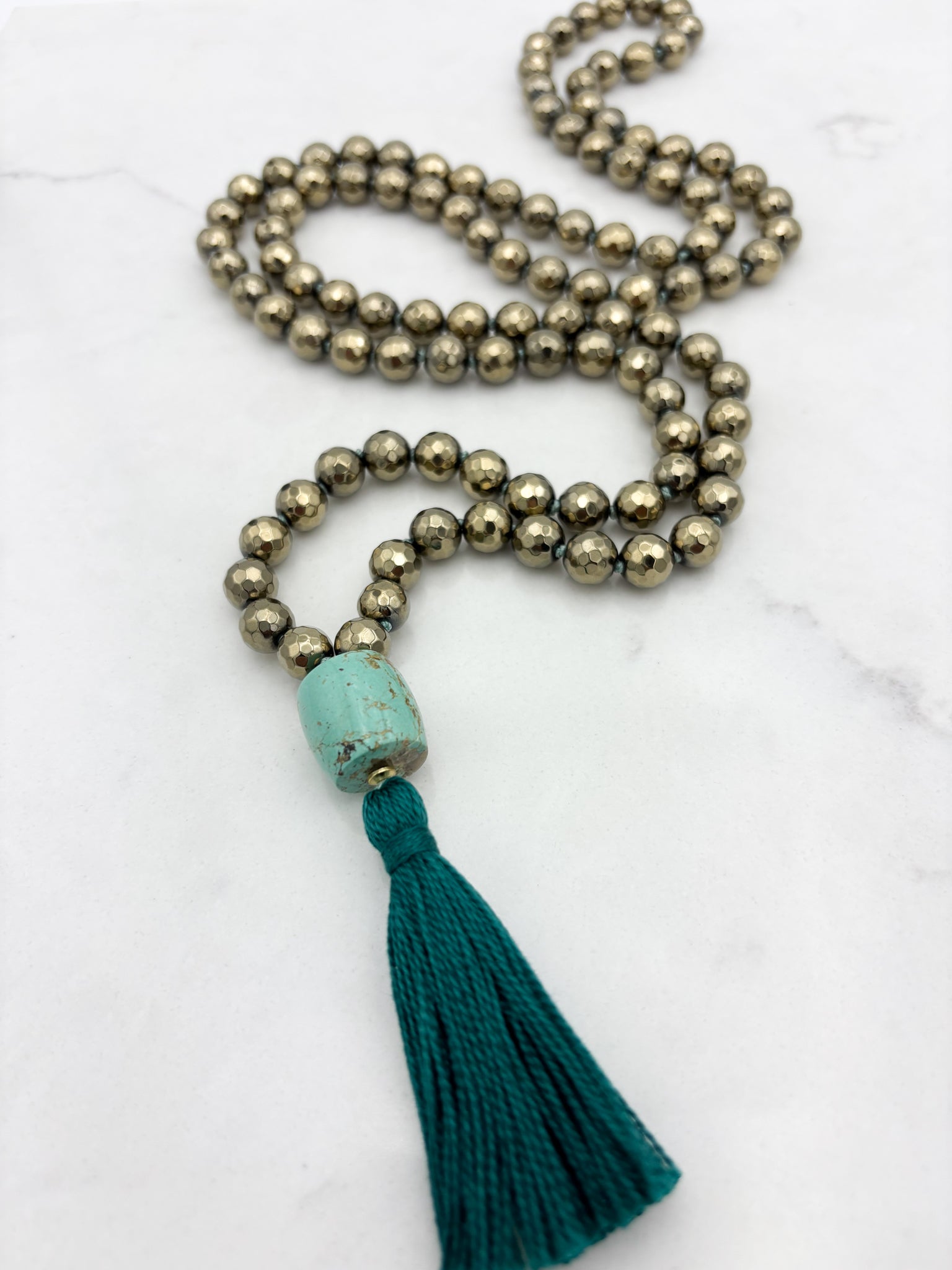 pyrite gemstone mala necklace with turquoise guru bead and green tassel | radiant malas | handmade in boulder, colorado