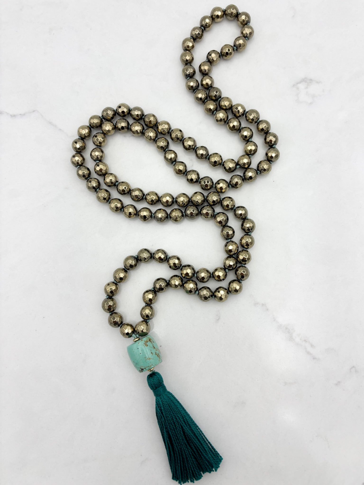 pyrite gemstone mala necklace with turquoise guru bead and green tassel | radiant malas | handmade in boulder, colorado