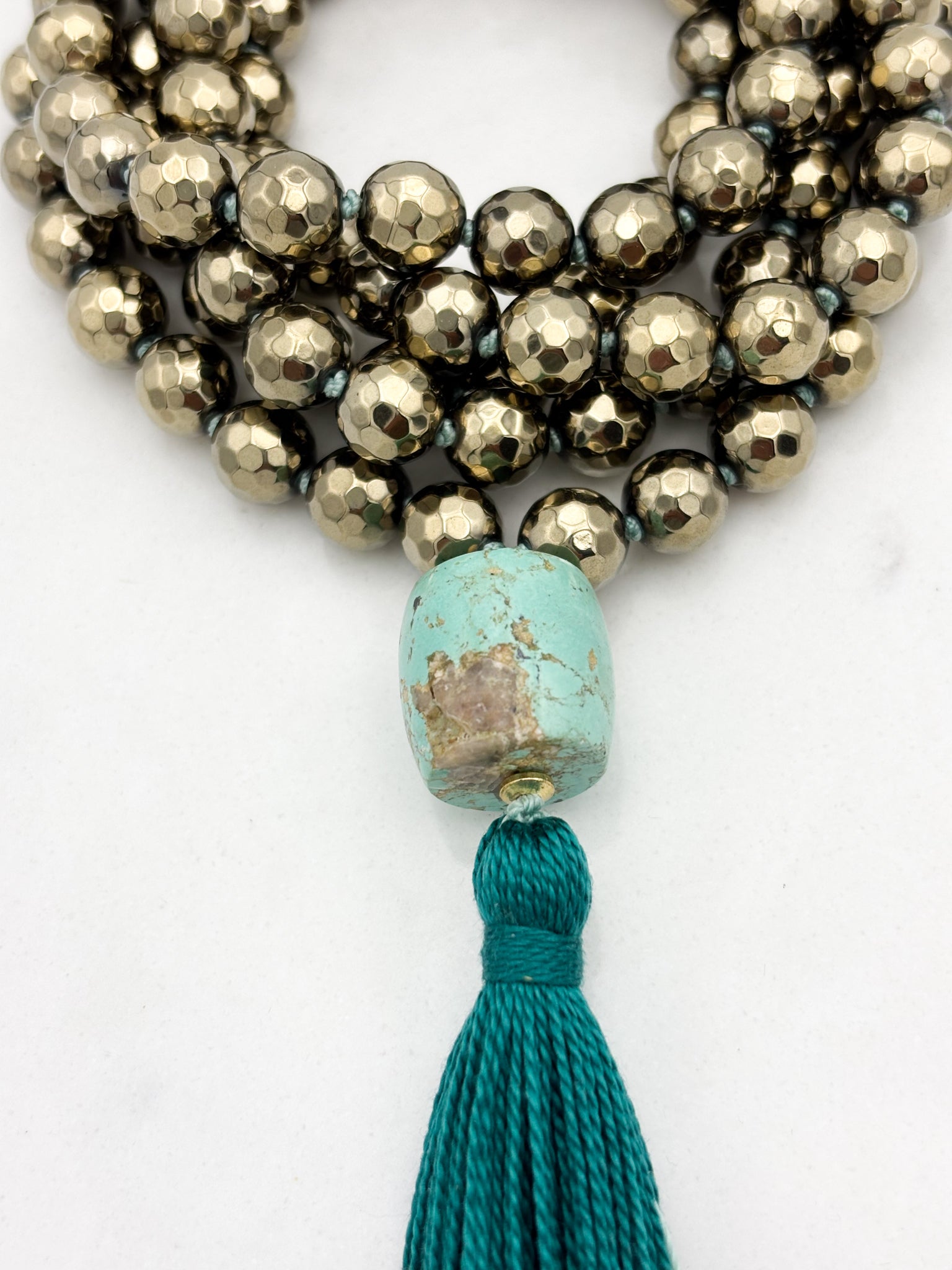 pyrite gemstone mala necklace with turquoise guru bead and green tassel | radiant malas | handmade in boulder, colorado