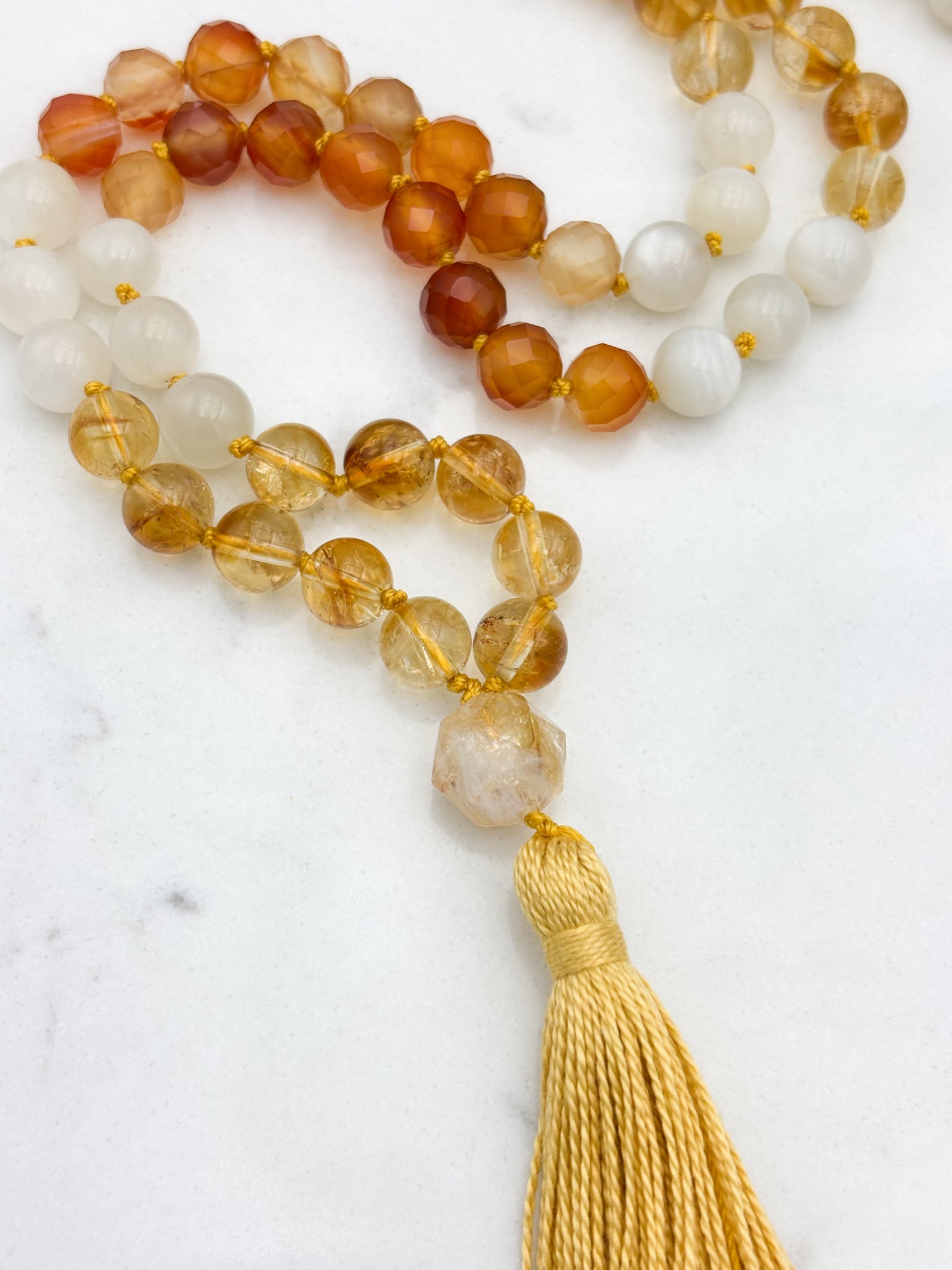 Reawakening gemstone mala with Citrine, Carnelian and Moonstone beads with Citrine guru bead and yellow tassel | handmade in boulder, colorado | radiant malas