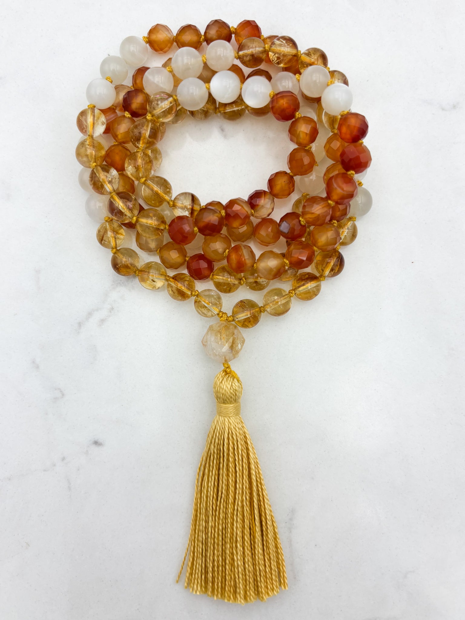 Reawakening gemstone mala with Citrine, Carnelian and Moonstone beads with Citrine guru bead and yellow tassel | handmade in boulder, colorado | radiant malas