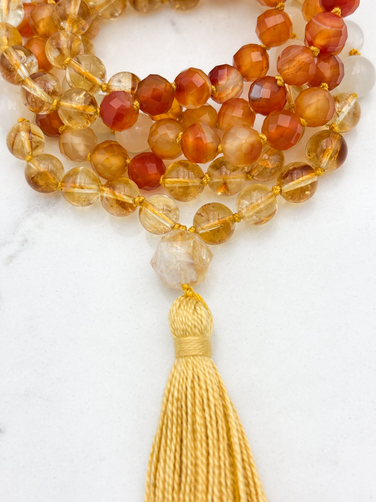 Reawakening gemstone mala with Citrine, Carnelian and Moonstone beads with Citrine guru bead and yellow tassel | handmade in boulder, colorado | radiant malas