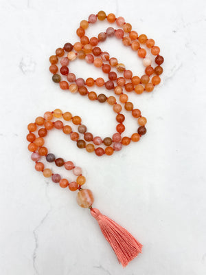 Red Botswana Agate Gemstone Mala with carnelain guru bead and peach tassel | radiant malas | handmade in Boulder, colorado