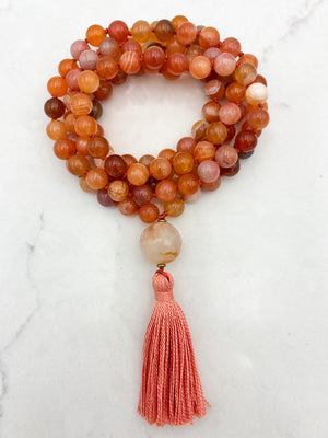 Red Botswana Agate Gemstone Mala with carnelain guru bead and peach tassel | radiant malas | handmade in Boulder, colorado