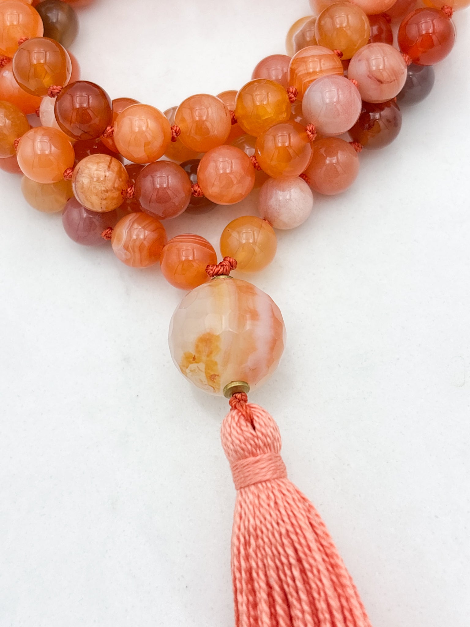 Red Botswana Agate Gemstone Mala with carnelain guru bead and peach tassel | radiant malas | handmade in Boulder, colorado