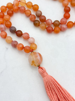 Red Botswana Agate Gemstone Mala with carnelain guru bead and peach tassel | radiant malas | handmade in Boulder, colorado