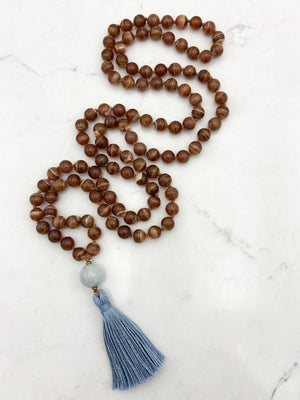 rhodochrosite gesmtone mala with burma jade guru bead and blue tassel | radiant malas | handmade in boulder, colorado