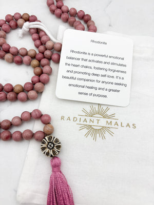 rhodonite gemstone mala with flower carved bone guru bead and pink tassel | radiant malas | handmade in boulder, colorado