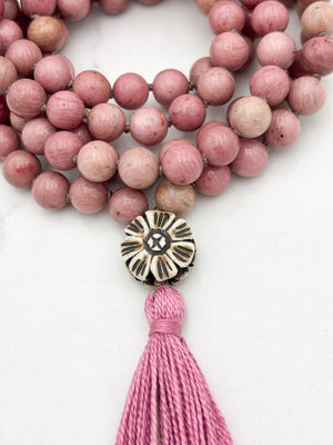 rhodonite gemstone mala with flower carved bone guru bead and pink tassel | radiant malas | handmade in boulder, colorado