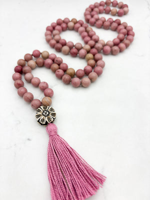 rhodonite gemstone mala with flower carved bone guru bead and pink tassel | radiant malas | handmade in boulder, colorado