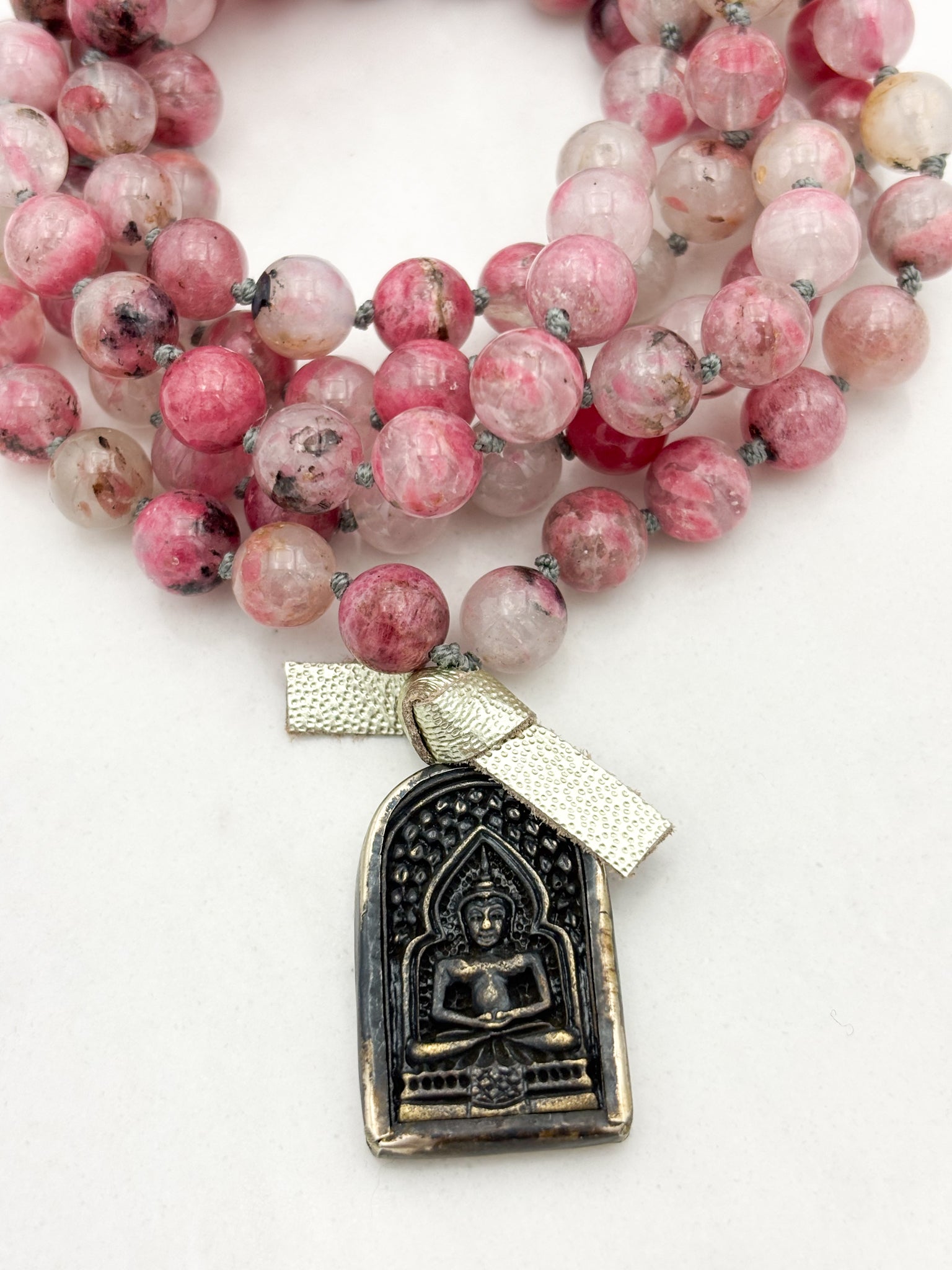 rhodonite in quartz gemstone mala with brass buddha pendant | radiant malas | handmade in boulder, colorado