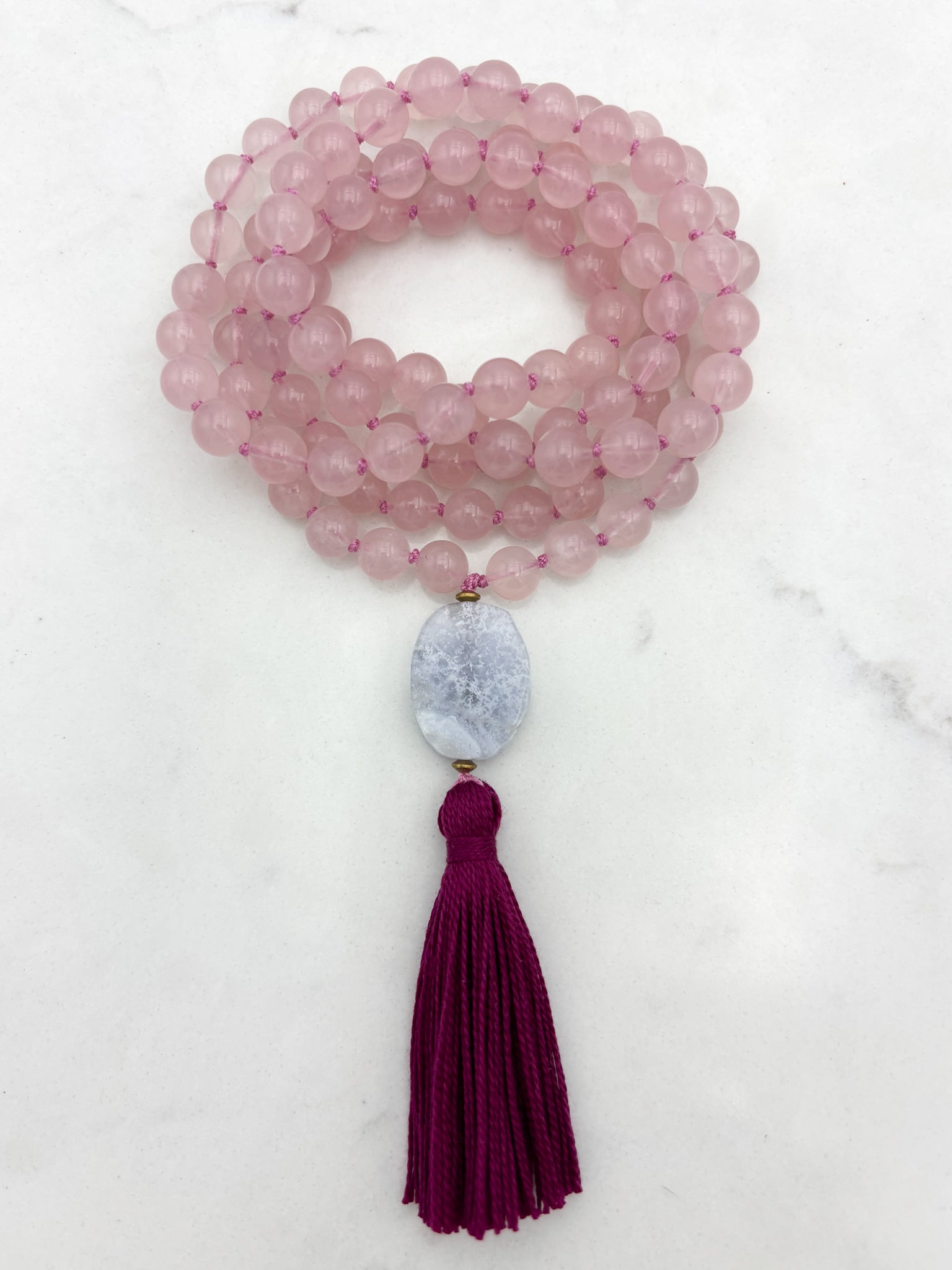 rose quartz gemstone mala necklace with blue lace agate guru bead and dark pink tassel | radiant malas | handmade in boulder, colorado