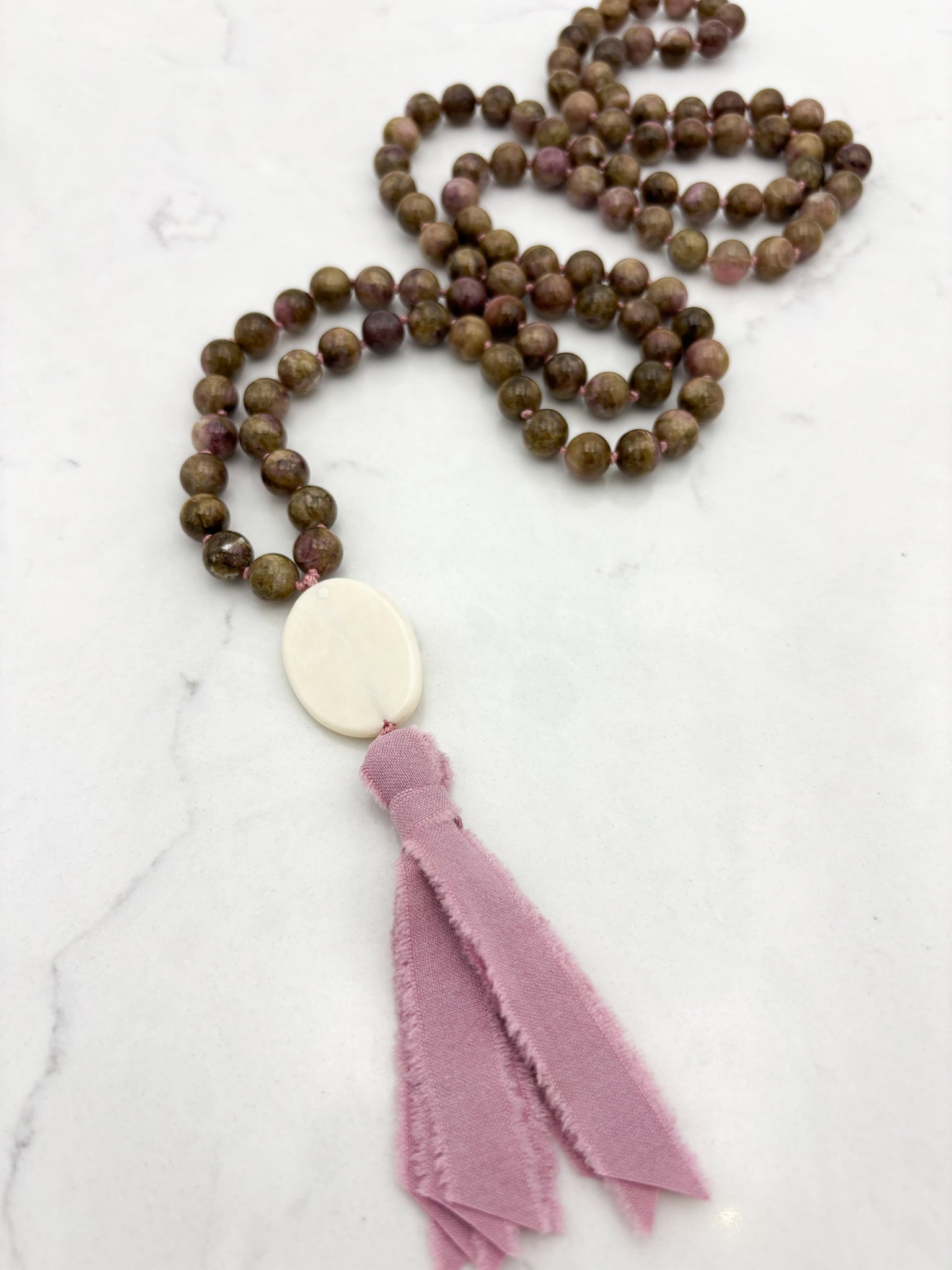 rosebud cat's eye tourmaline gemstone mala necklace with oval bone guru bead and silk tassel | radiant malas | handmade in boulder, colorado