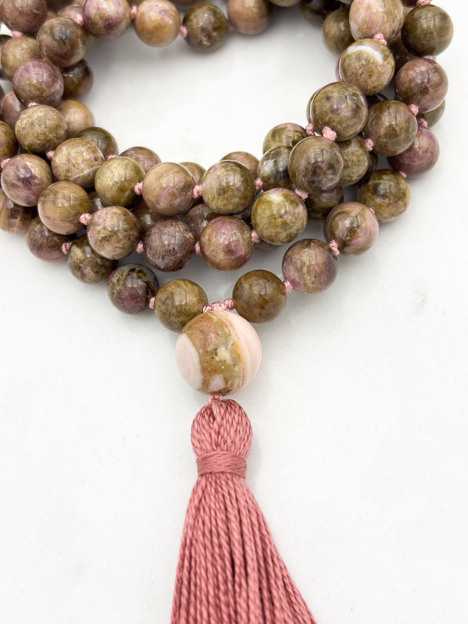 rosebud cat's eye tourmaline gemstone mala necklace with rhodochrosite guru bead and rose colored tassel | radiant malas | handmade in boulder, colorado