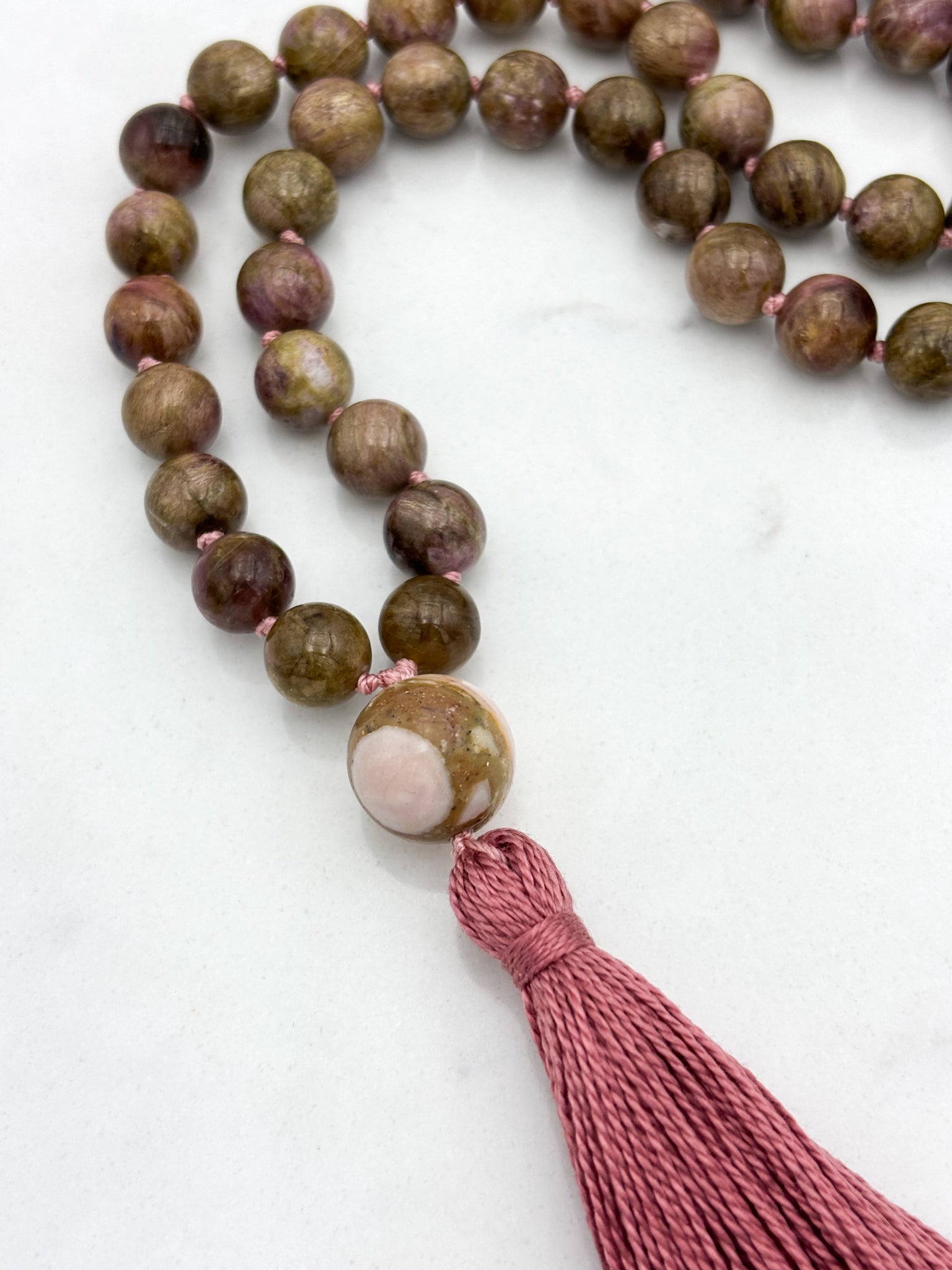 rosebud cat's eye tourmaline gemstone mala necklace with rhodochrosite guru bead and rose colored tassel | radiant malas | handmade in boulder, colorado