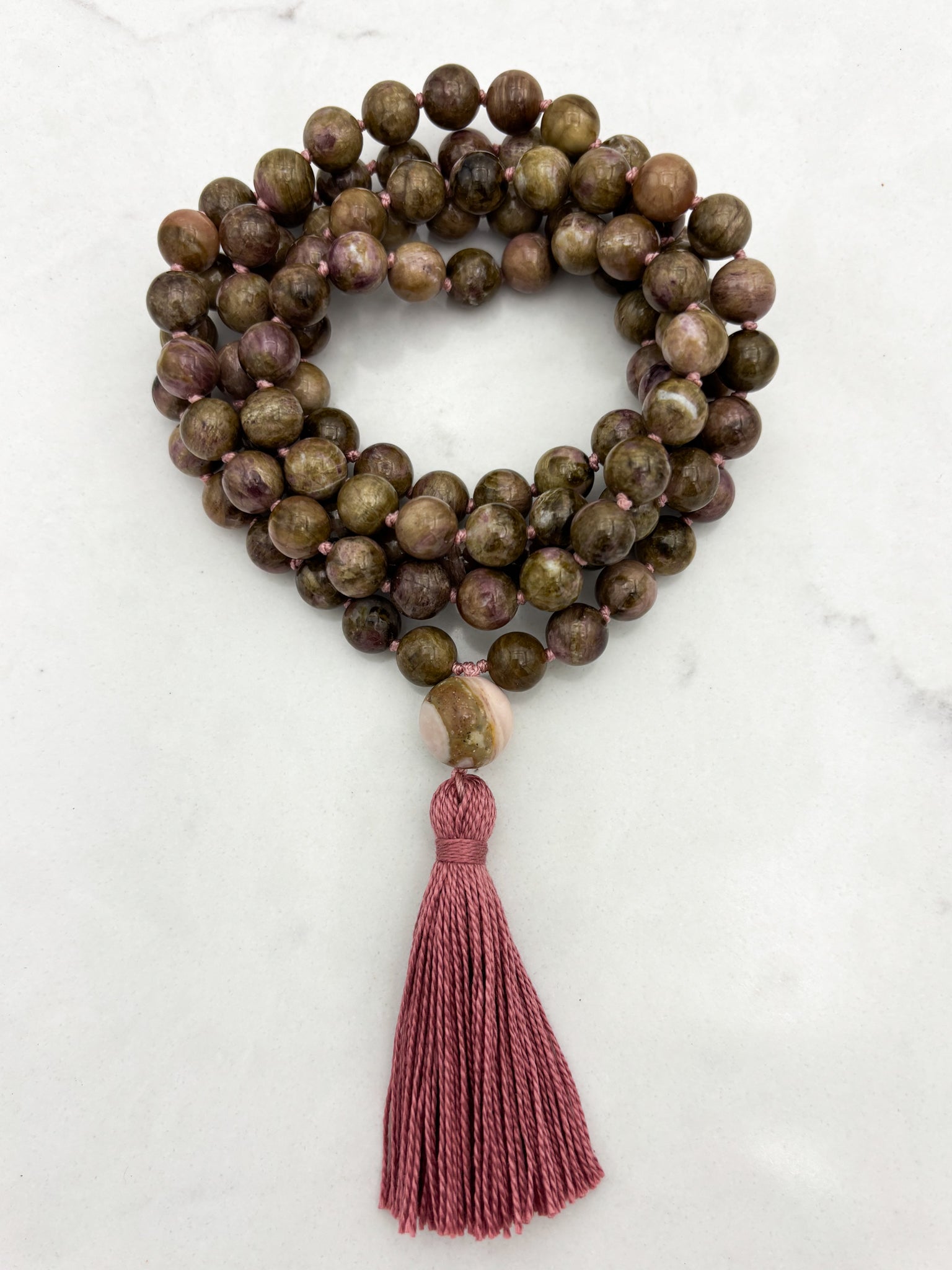 rosebud cat's eye tourmaline gemstone mala necklace with rhodochrosite guru bead and rose colored tassel | radiant malas | handmade in boulder, colorado