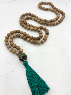 Sandalwood mala meditation necklace with tibetan guru bead w/ turquoise and lapis, and a green tassel | radiant malas | handmade in boulder, colorado