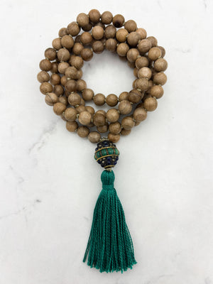 Sandalwood mala meditation necklace with tibetan guru bead w/ turquoise and lapis, and a green tassel | radiant malas | handmade in boulder, colorado