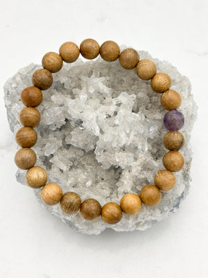 sandalwood bracelet with faceted amethyst grounding bead | radiant malas | handmade in boulder, colorado
