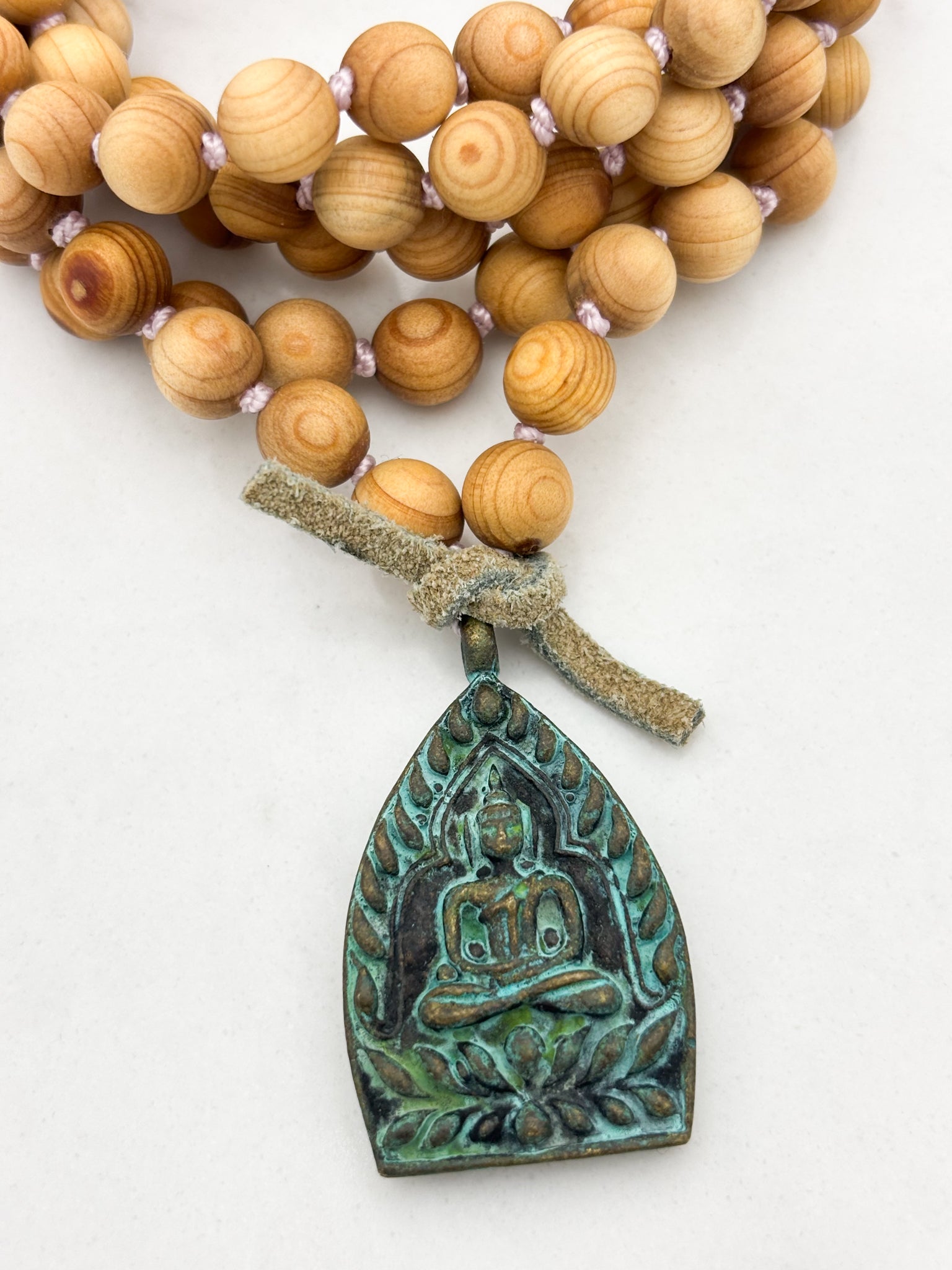 sandalwood mala with brass buddha pendant | radiant malas | handmade in boulder, colorado