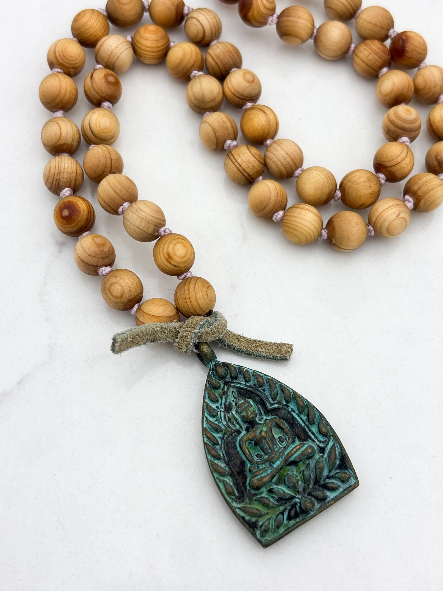 sandalwood mala with brass buddha pendant | radiant malas | handmade in boulder, colorado