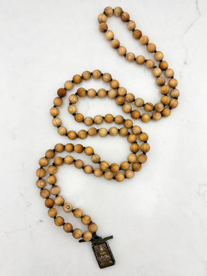 sandalwood mala with brass buddha pendant | radiant malas | handmade in boulder, colorado