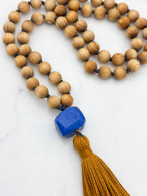 sandalwood mala with lapis guru bead and gold tassel | radiant malas | handmade in boulder, colorado