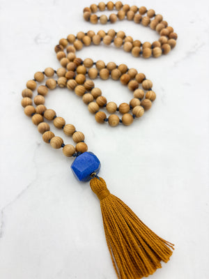 sandalwood mala with lapis guru bead and gold tassel | radiant malas | handmade in boulder, colorado