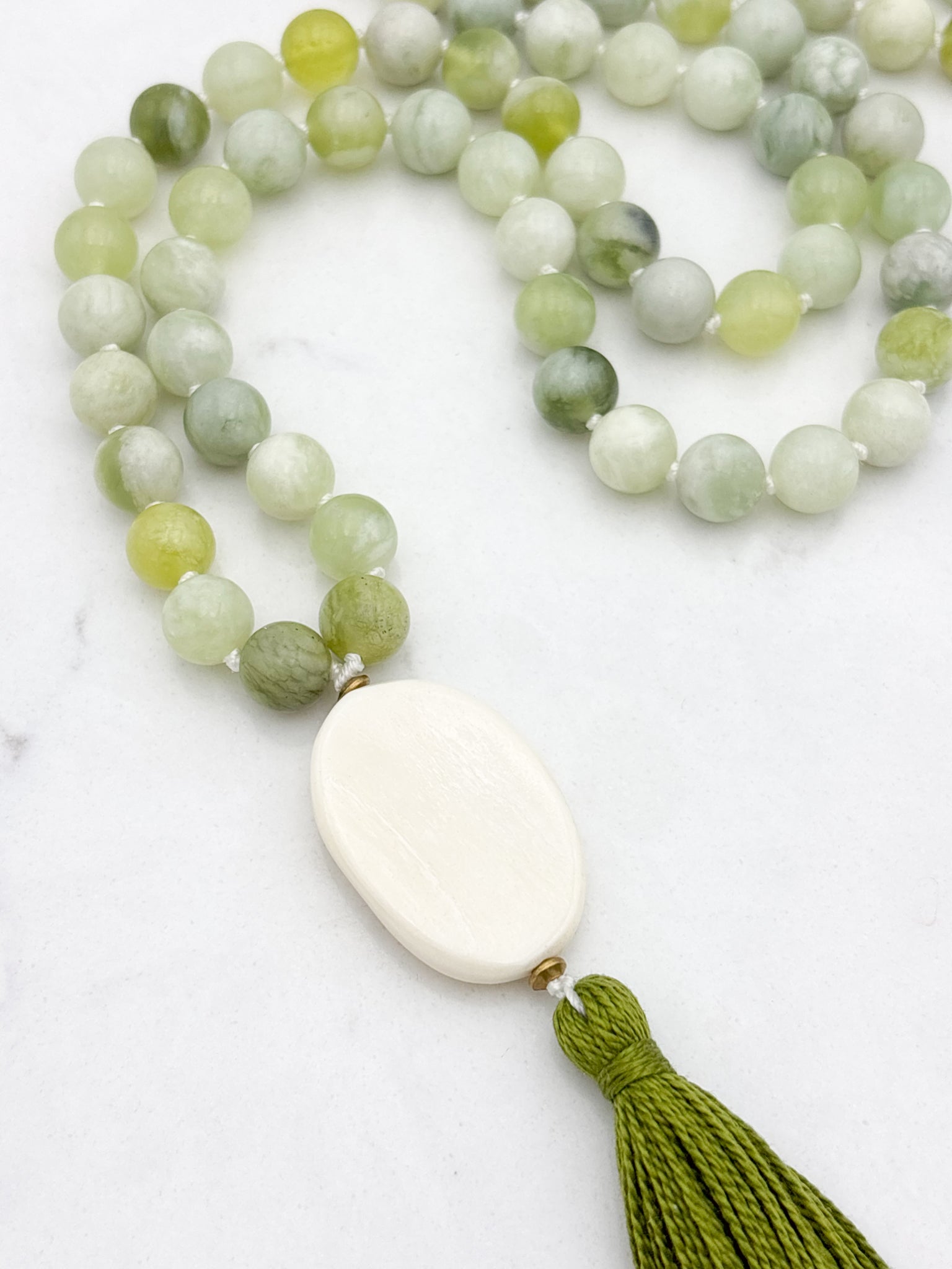serpentine jade gemstone mala with bone guru bead and green tassel | radiant malas | handmade in boulder, colorado