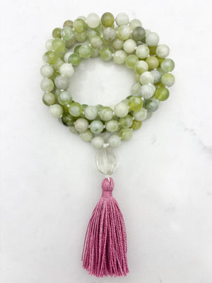 serpentine jade gemstone mala with melon shaped carved glass guru bead and pink tassel | radiant malas  handmade in boulder, colorado