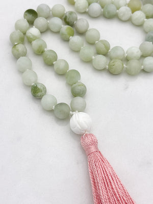 serpentine jade gemstone mala with tridacna shell guru bead and pink tassel | radiant malas  handmade in boulder, colorado