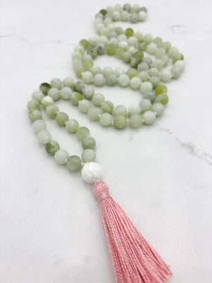 serpentine jade gemstone mala with tridacna shell guru bead and pink tassel | radiant malas  handmade in boulder, colorado
