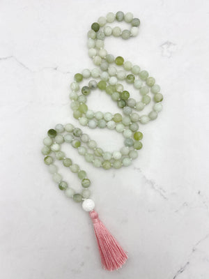 serpentine jade gemstone mala with tridacna shell guru bead and pink tassel | radiant malas  handmade in boulder, colorado