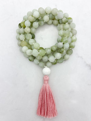 serpentine jade gemstone mala with tridacna shell guru bead and pink tassel | radiant malas  handmade in boulder, colorado