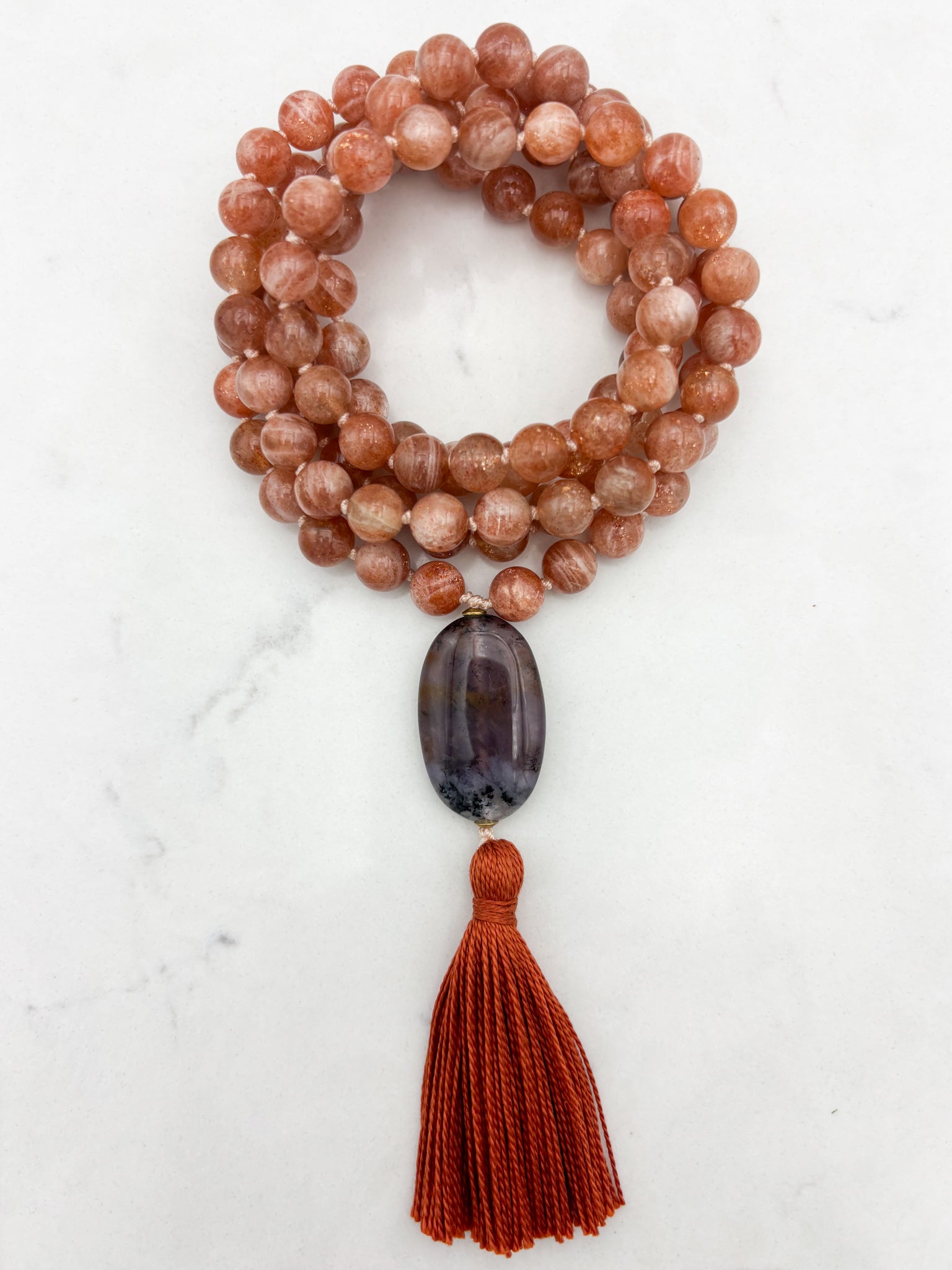 sunstone gemstone mala with ametrine guru bead and rust tassel | radiant malas | handmade in boulder, colorado