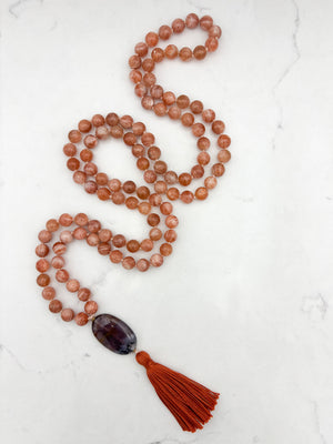 sunstone gemstone mala with ametrine guru bead and rust tassel | radiant malas | handmade in boulder, colorado
