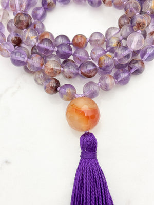 super 7 gemstone mala with carnelian guru bead and purple tassel | radiant malas | handmade in boulder, colorado