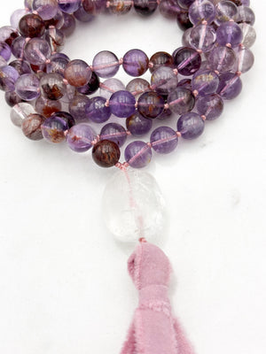super 7 gemstone mala with clear quartz guru bead and pink silk tassel | radiant malas | handmade in boulder, colorado