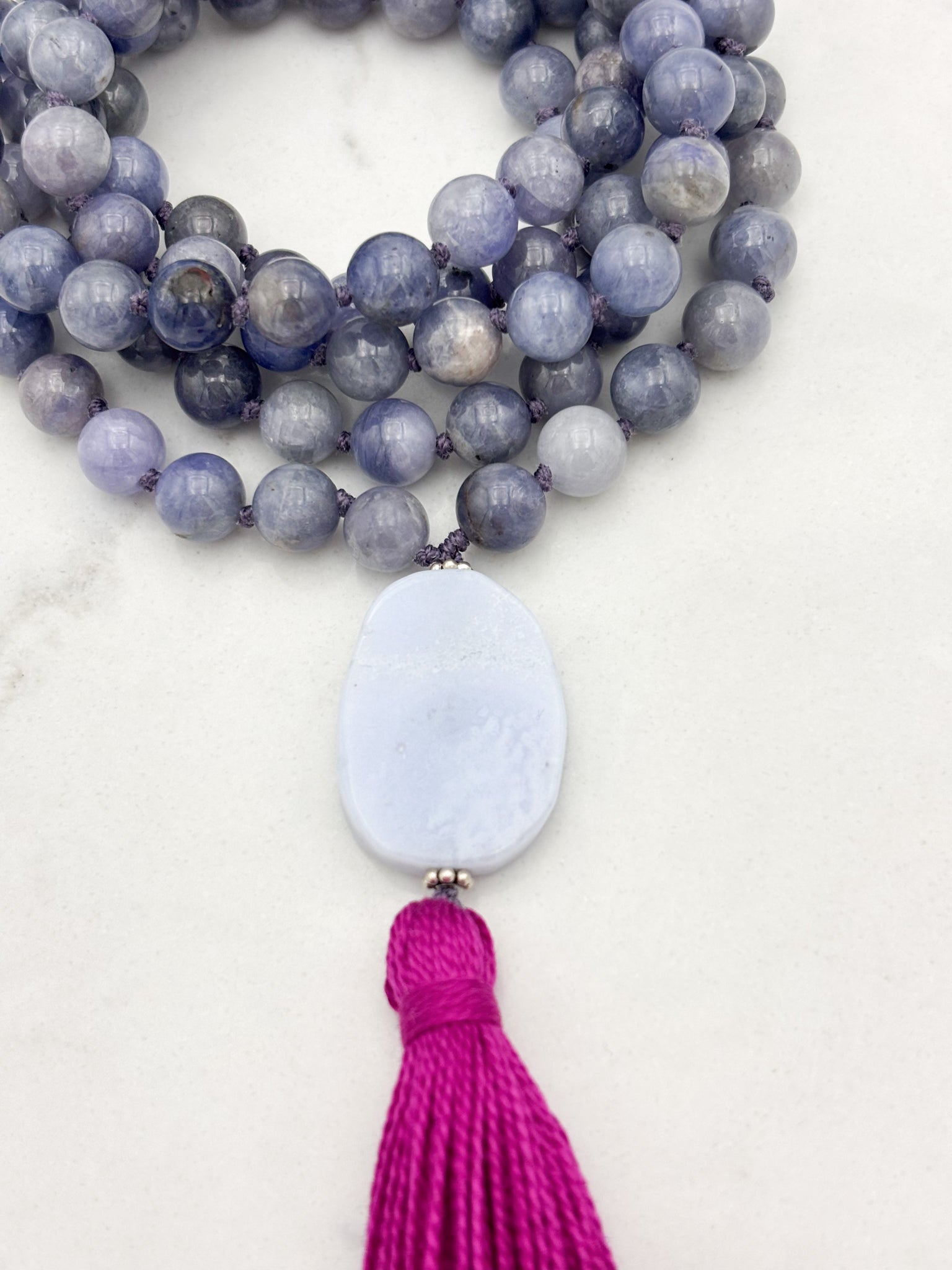 tanzanite gemstone mala necklace with blue lace agate guru bead and hot pink tassel | radiant malas | handmade in boulder, colorado